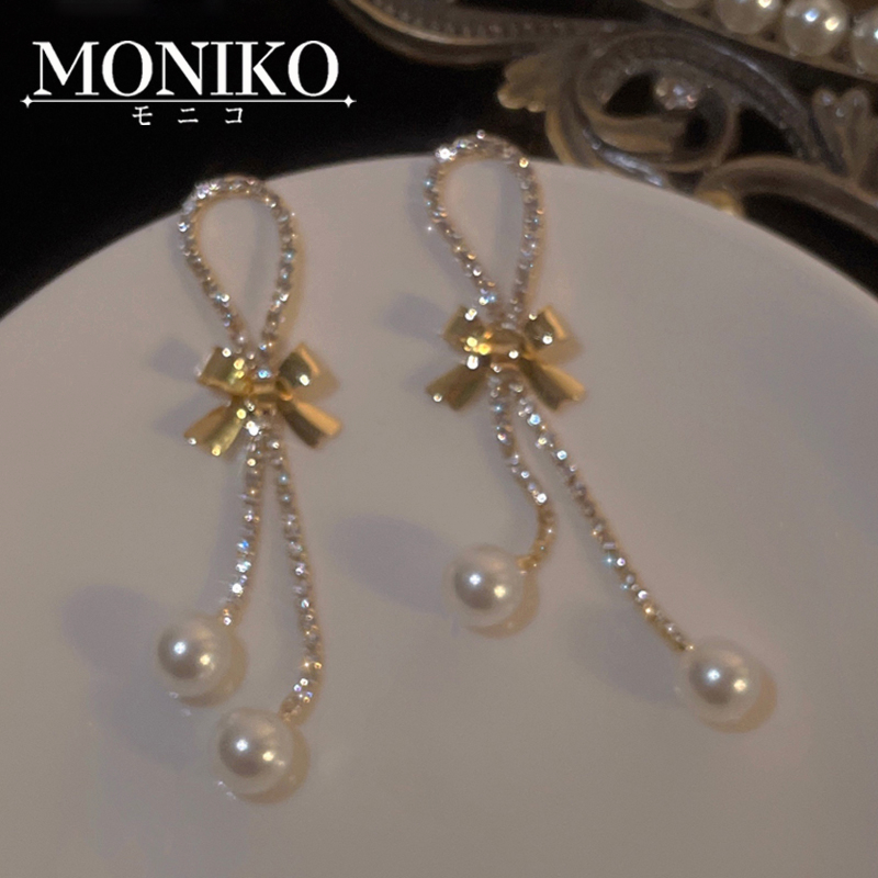 MONIKO มุกพู่กุทัณฑ์เงิน 925 ประดับโบว์ ไข่มุก พู่ยาว แฟชั่นยอดนิย