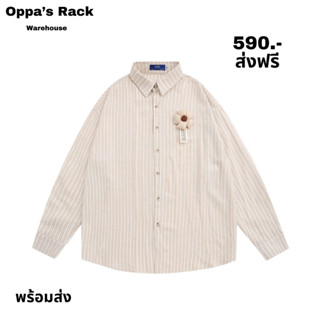 เสื้อเชิ้ตแขนยาวสีครีมพร้อมเข็มกลัดดอกไม้