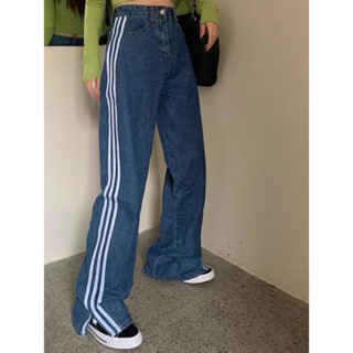 กางเกงยีนส์เอวสูงแต่งแถบข้าง SIDE STRIPED SLIT HEM DENIM PANTS