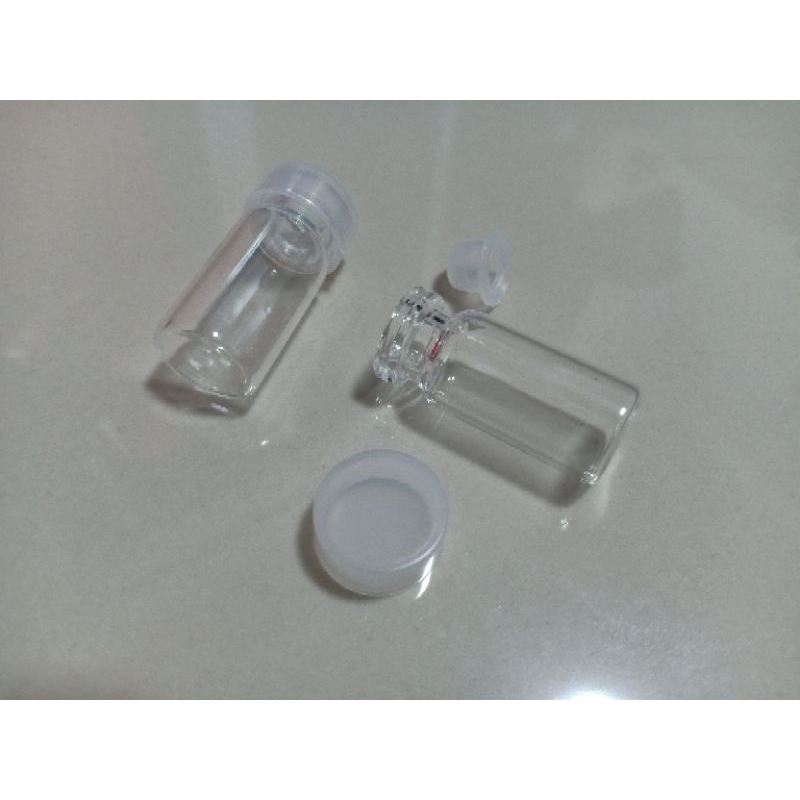 ขวดแก้วขนาด 2 ml. ฝาปิดพลาสติกสีใสพร้อมจุกปิดกันซึม (ขั้นต่ำ 10 ชิ้น)