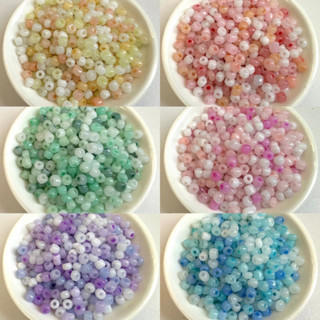 ลูกปัดแก้วเม็ดทราย คละสีผสมโทนพาสเทล 6/0(4mm)