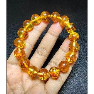 สร้อยข้อมืออำพันโปแลนด์ : อำพันแท้ธรรมชาติ เกร็ดยางลายดอกไม้ เนื้อสีทองผ่องใส