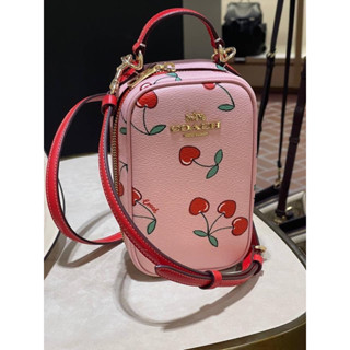 พร้อมส่ง แท้ 🇺🇸💯% New Coach EVA PHONE CROSSBODY WITH HEART CHERRY PRINT (COACH CF371) GOLD/POWDER PINK MULTI