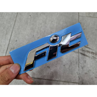 โลโก้ ฟิท ฟ้อนเก่า เงินล้วน ฮอนด้า ขนาด 125 * 30 mm ปี 2003 - 2006 Honda Fit GD car logo emblem for rear trunk