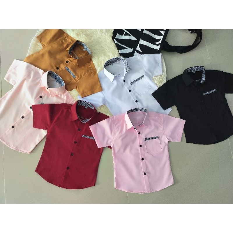 เสื้อเชิ้ตเด็กผู้ชายสีพื้น ผ้าคอตตอนทวิล แต่งกุ๊น