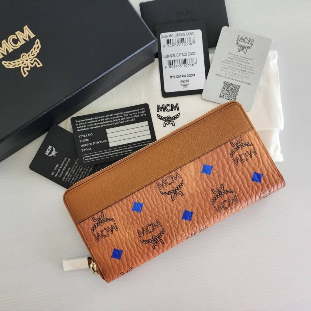 กระเป๋าสตางค์ใบยาวซิบรอบ MCM แท้ ส่งฟรี