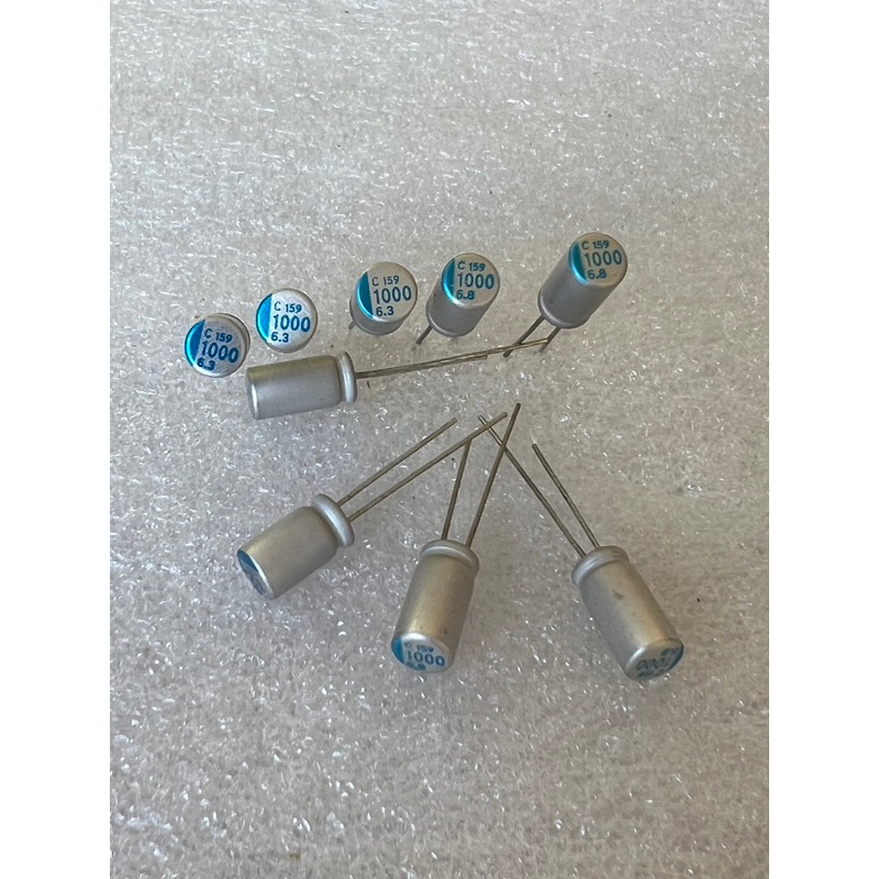 คาปาซิเตอร์  1000UF 6.3V  1000UF 6.3V  C1000UF 6.3V ขนาด6x11mm.แถบสีฟ้าใหม่แกะกล่อง C1000UF 6.3V (10