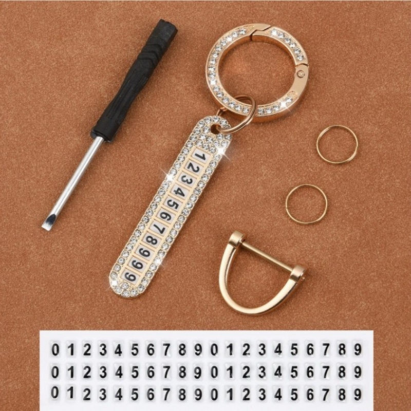 พวงกุญแจรถยนต์ คริสตัล พวงกุญแจ แฟชั่น พวงกุญแจโลหะ พร้อมเบอร์โทรกันหาย Anti Lost Car Gold Diamond K