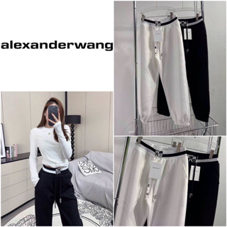 กางเกงขายาวปลายขาจั้ม Alexander Wang เนื้อผ้าปั้มลายโลโก้แบรนด์ทั้งตัว