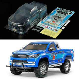 TAMIYA 51611 บอดี้ TOYOTA HILUX EXTRA CAB ยังไม่ได้ตัดเจาะและทำสี สำหรับรถกลุ่ม CC ที่มี wheelbase 267มม.