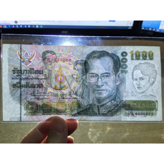 (ลายน้ำราชินี)ธนบัตร 1000 บาท แบบที่ 14 ผ่านการใช้งาน(สินค้าจัดส่งตรงตามรูป)