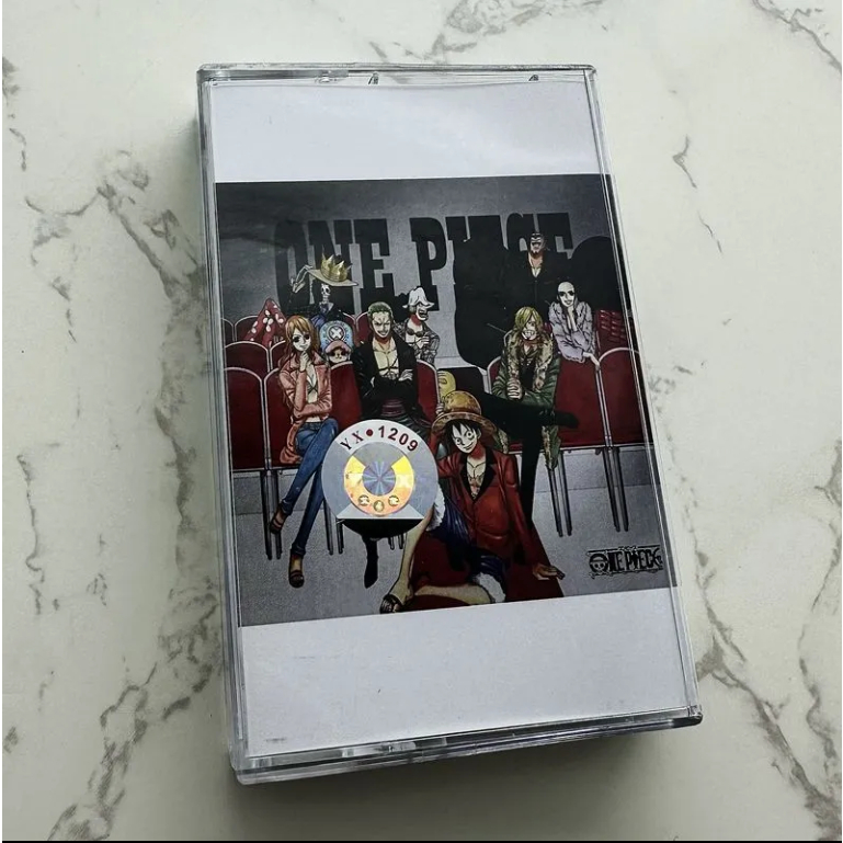 เทปคาสเซ็ท วันพีซ ONE PIECE SUPER BEST แบรนด์ใหม่ยังไม่ได้รื้อ แนบหนังสือเนื้อเพลง ซาวด์แทร็กอะนิเมะ