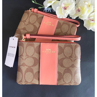 🌷🌷คล้องมือCoach ลายซีสีคาราเมลคาดสีส้มสีใหม่ ไซส์ S1zip🌷🌷