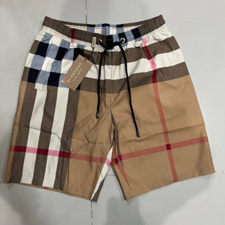 BURBERRY LARGE CHECK DRAWCORD SWIM SHORTS IN ARCHIVE BEIGE กางเกงขาสั้นเอวยางยืด ผูกเชือก แบรนด์เบอเบอรี่ ลายสก็อต