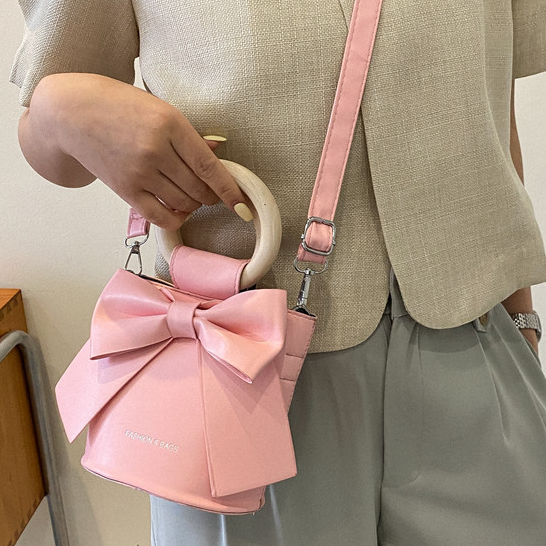 กระเป๋าหน้าโบว์   กระเป๋าสไตส์เกาหลีน่ารักหูจับไม้  เเบบใหม่ทรงถังสไตส์สาวหวาน - รูปที่ 5