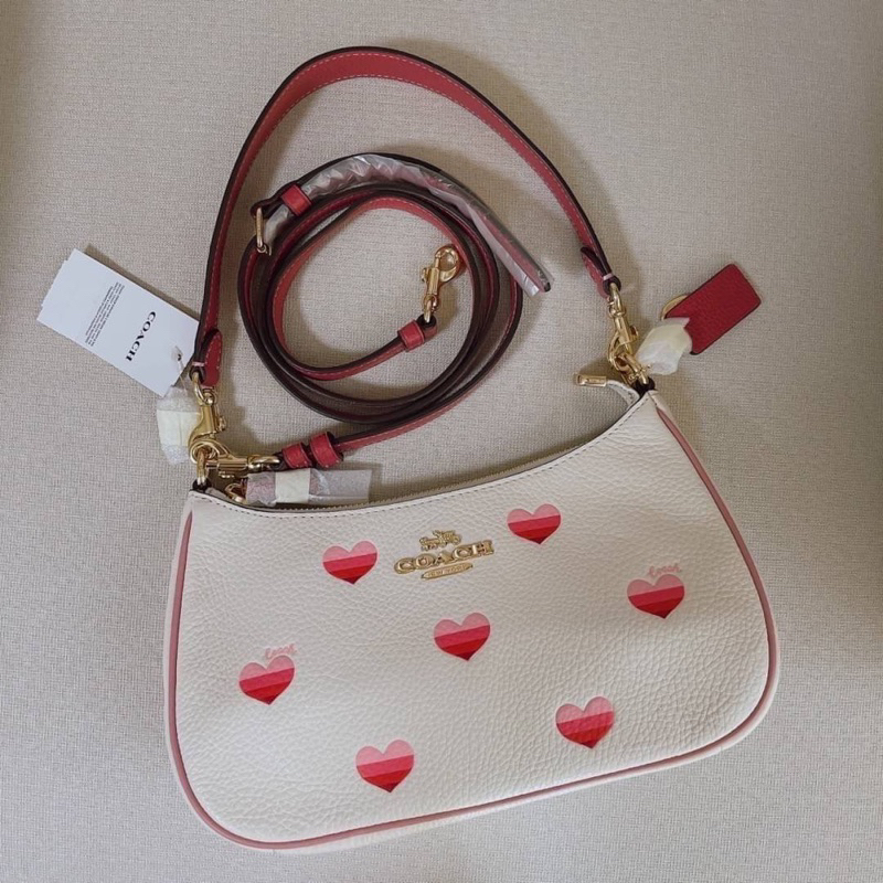 กระเป๋าสะพายข้าง Coach Teri Shoulder Bag With Stripe Heart Print CA251