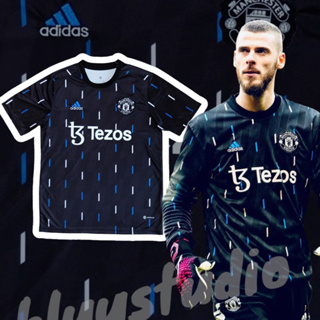 bluu เสื้อบอลแมนเชสเตอร์ พรีแมท สีดำ Tezos ปี 2022/23 เกรดแฟนบอล  Pre-Match Black Jersey 2022/23 Fans (AAA)