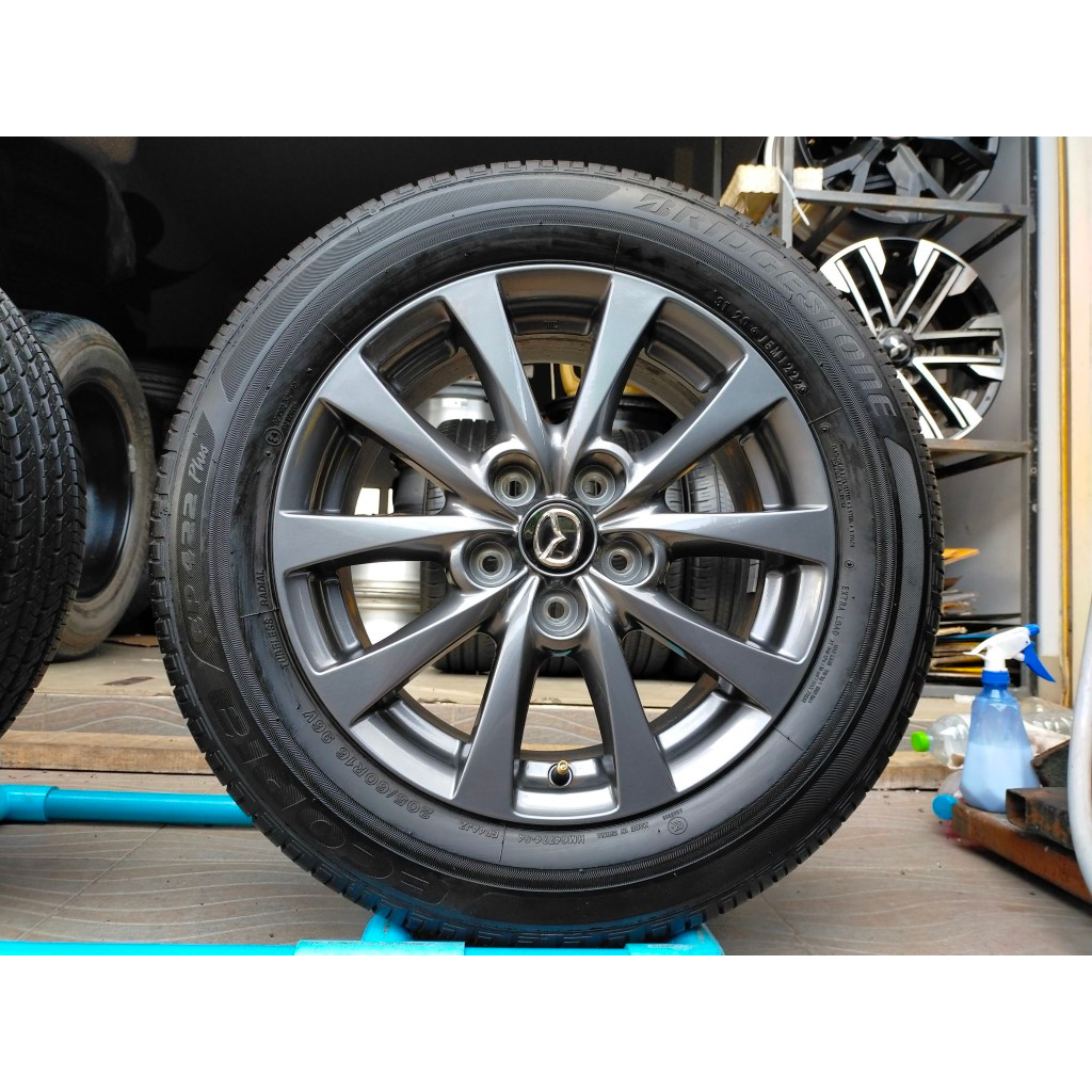 แม็กมาสด้า ป้ายแดงสีเดิม ขอบ16 พร้อมยางบริสโตน 205 60 16 ปี22 ใส่มาสด้า3 , cx3.  ได้ทุกรุ่น