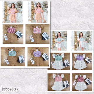 BS3596  จั้มสูทขาสั้นแต่งป้ายหน้า อกแต่งกุหลาบแขนระบาย ทรงปาดไหล่มีสายคล้องคอผูกโบว์ ต่อกางเกงผ้าบาร์บี้ ป้ายหน้าแต่งกระ