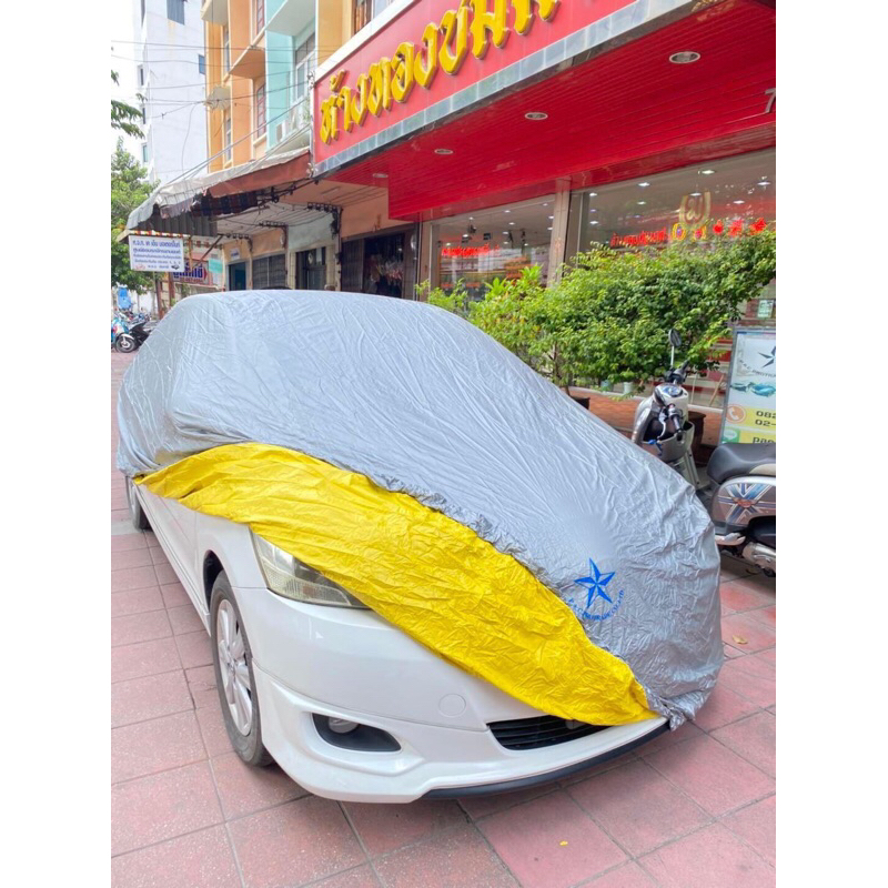 ผ้าคลุมรถเก๋ง สปันบอนด์โพลีเอดเตอร์ (โลโก้รูปดาว สีฟ้า 🔷)