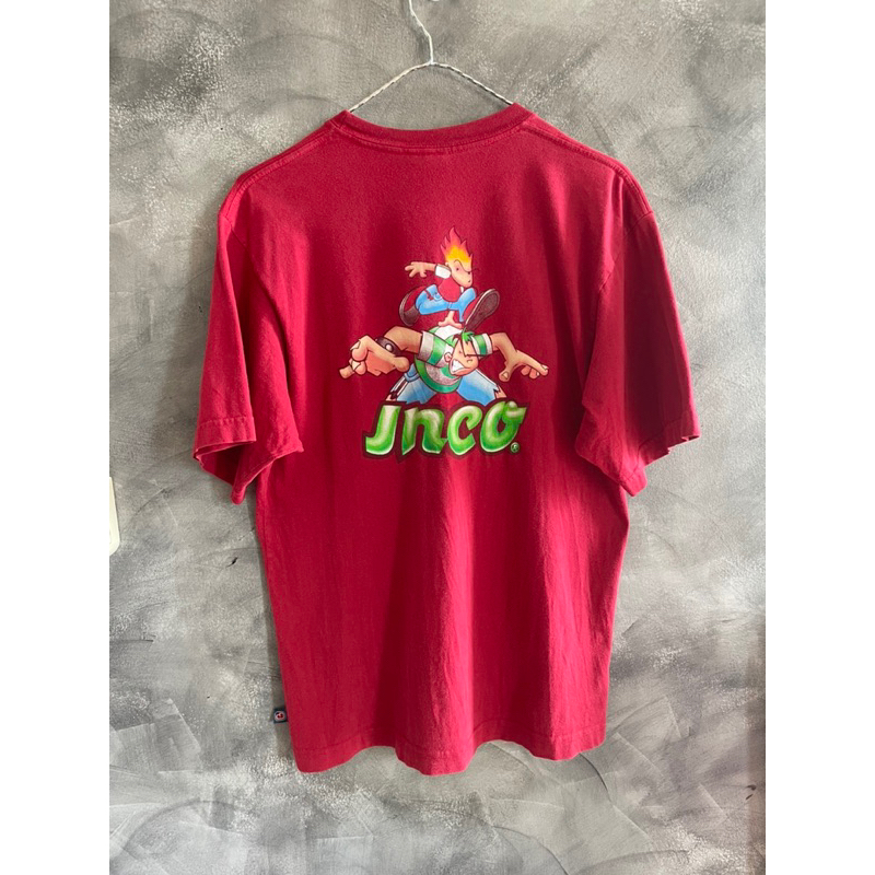 เสื้อยืดวินเทจแขนสั้น แบรนด์ JNCO สภาพดี สกรีนสวย ตำหนิ 1 รู