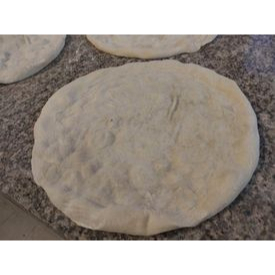 Pizza dough 12 inches 33 cm .Always baked in stone oven