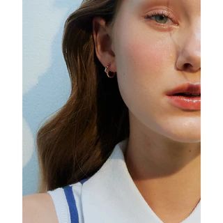 Julys - knot huggie earrings