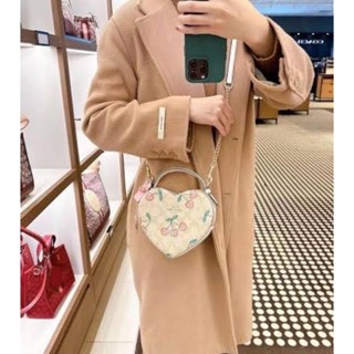 💓กระเป๋าทรงรูปหัวใจ 💓💓 ลายเชอรี่น่ารักมาก🌈NEW COACH Heart Crossbody In Signature Canvas With Heart Cherry Print