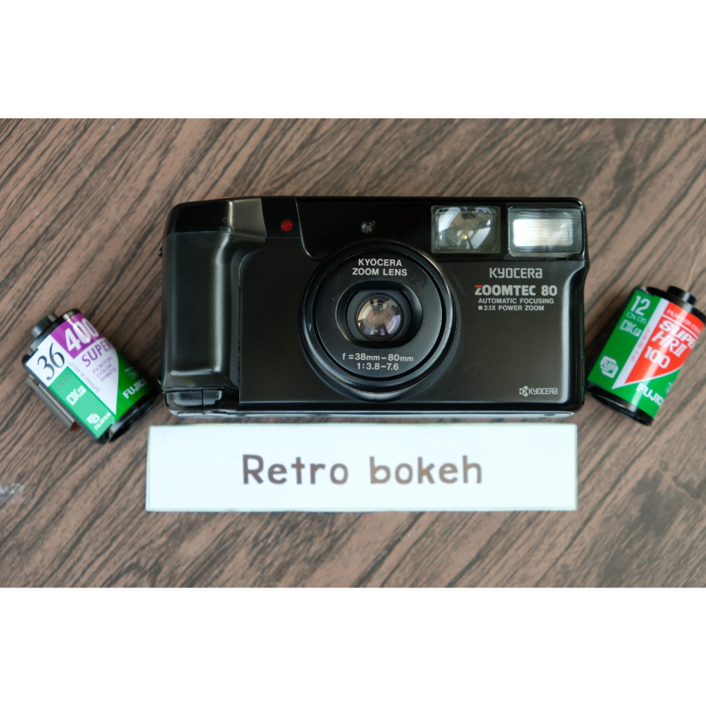กล้องฟิล์ม KYOCERA ZOOMTEC80 มาพร้อมเลนส์ 38-80mm สภาพดี เลนส์คม บันทึกวันที่ลงในภาพได้ ใช้งานง่ายเล็งแล้วถ่ายได้เลยครับ