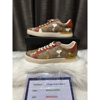 Coach X Peanuts Clip Low Top Sneaker In Signature Canvas With Snoopy Woodstock Print รองเท้าสนึกเกอร์ ลายสนุ๊ปปี้