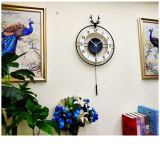 Deer head clock นาฬิกาแขวนห้องนั่งเล่น ทันสมัย ​​เรียบง่าย สร้างสรรค์ แฟชั่น นาฬิกาบ้าน