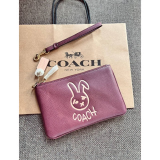 COACH SMALL WRISTLET WITH RABBIT