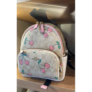 พร้อมส่ง แท้ 🇺🇸💯% New Coach เป้มินิ MINI COURT BACKPACK IN SIGNATURE CANVAS WITH HEART CHERRY PRINT (COACH CF424) GOLD/L