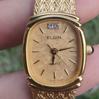 นาฬิกาวินเทจมือสอง สำหรับสาวๆ Vintage Elgin Swiss Made เพชร2เม็ด ตัวเรือนสีทอง สายถักสีทอง สภาพสวยใหม่มากๆ ระบบถ่าน