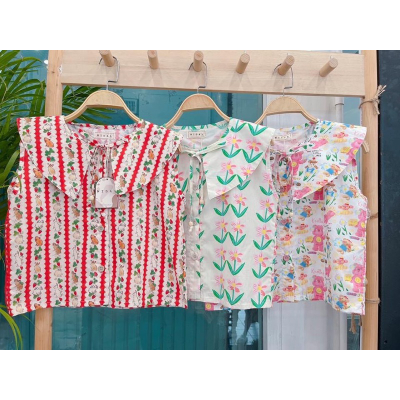 เสื้อแขนกุด ป้ายnida