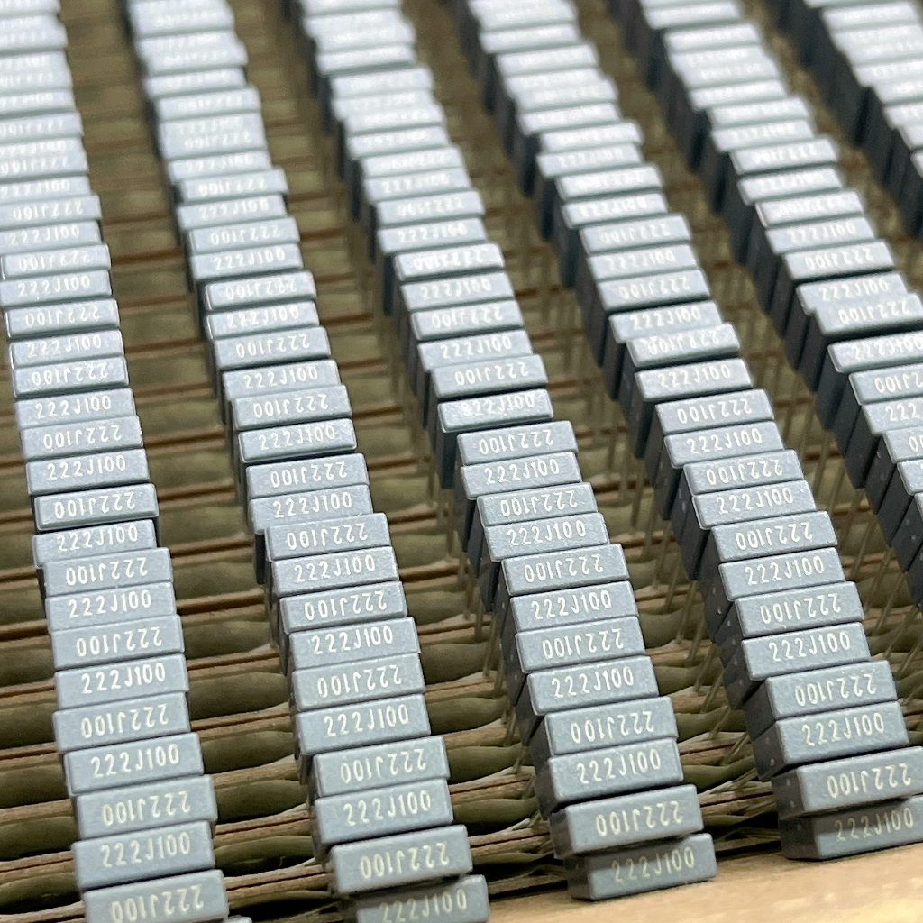 (จำนวน 100ตัว)  C. Poly โพลี 100v ค่า 222 222J100  ตัวสีเทา