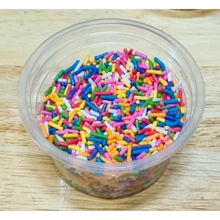 ท้อปปิ้ง เรนโบว์ม่วงฟ้า เกล็ด น้ำตาล ตกแต่ง ขนม แบ่งขาย 50g. ราคาถูก ตรา Best Choc