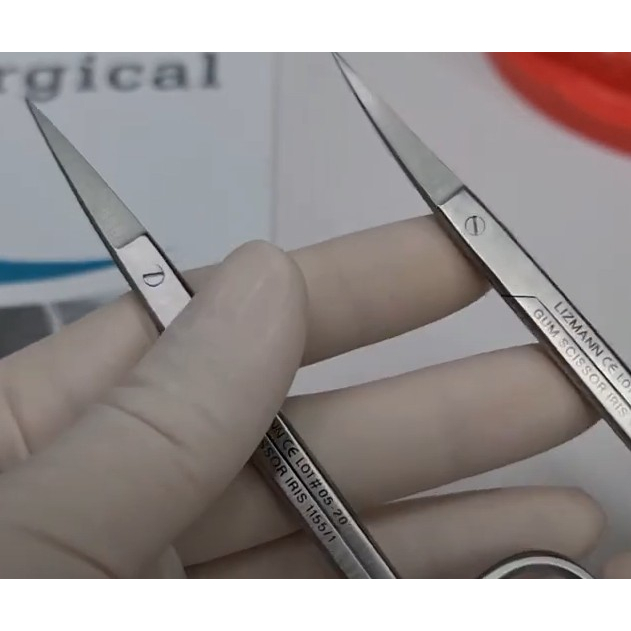 Gum scissor Iris 11 cm.