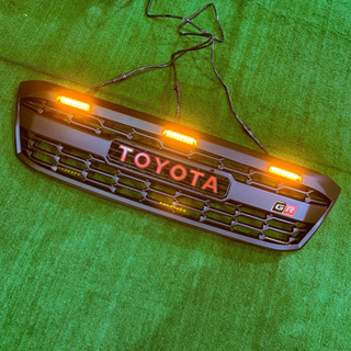 กระจังหน้า vigo 2005 2007 2008 2009 2010 ลาย GR มีไฟ LED ยาว 3 เส้น สีส้ม ลายใหม่ล่าสุด