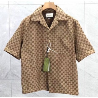 เสื้อgucci​ส่งฟรีมีของแถม