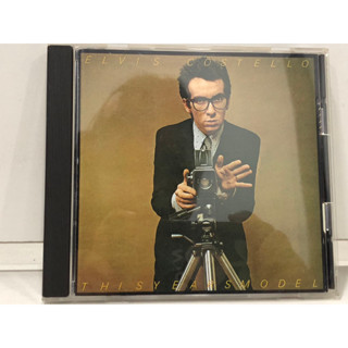 1 CD MUSIC  ซีดีเพลงสากล    ELVIS COSTELLO &amp; THE ATTRACTIONS THIS YEARS MODEL   (A2B53)