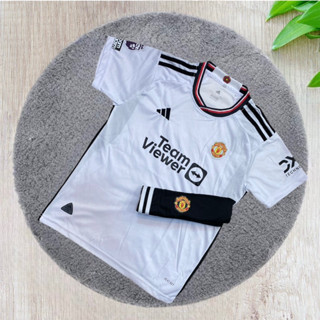 เสื้อฟุตบอล ชุดกีฬา เด็ก ทีม แมนยู ทีมเยือน แบบใหม่ล่าสุด 2023 มีเสื้อพร้อมกางเกง เนื้อผ้ายืด ใส่สบาย ราคาถูก