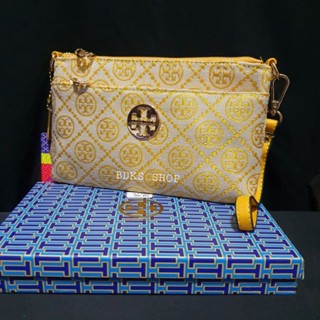 กระเป๋า TORRY BURRCH MONOGRAM JACQUARD WRISTLET WALLET