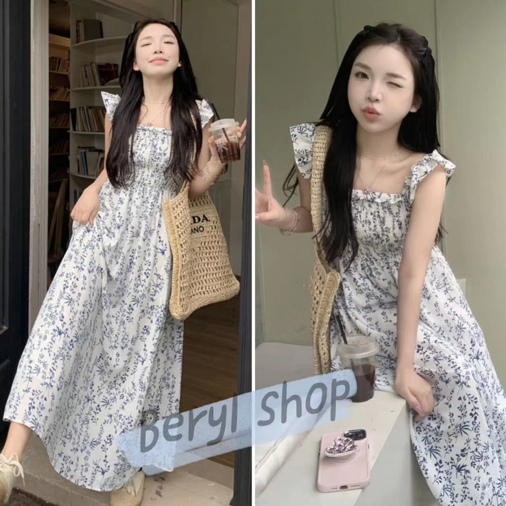 Beryl เดรส กระโปรงลายดอกไม้สีฟ้าสไตล์วันหยุดริมทะเล กระโปรงแขวนแขนบินขนาดเล็ก กระโปรงยาวอารมณ์ที่ปลูกฝังด้วยตนเอง