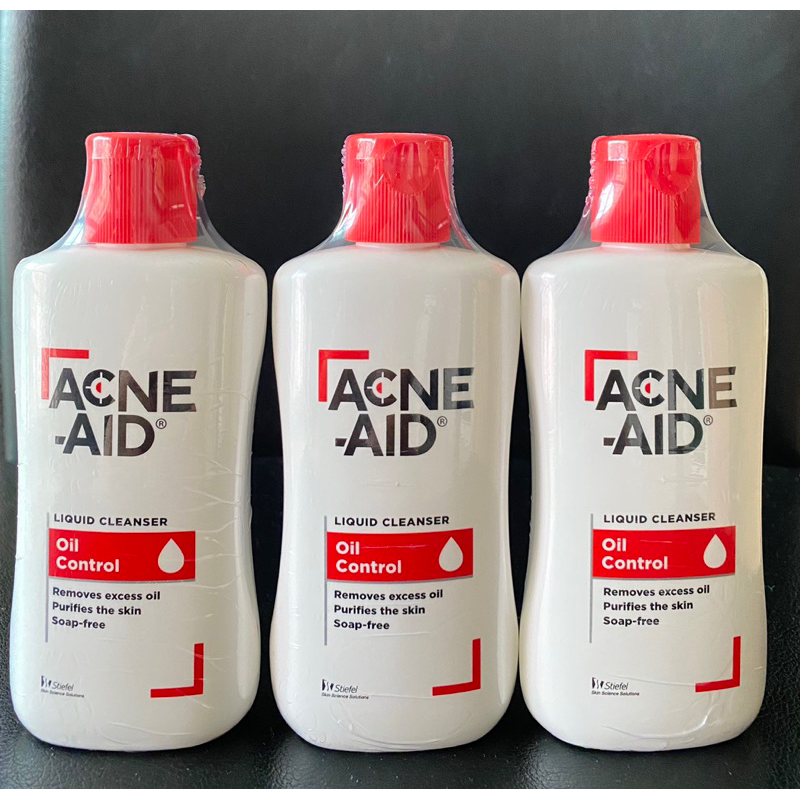 ล้างหน้า Acne Aid แอคเน่ เอด สีแดง ลิควิด คลีนเซอร์ ลดสิวหน้ามัน 100 ml