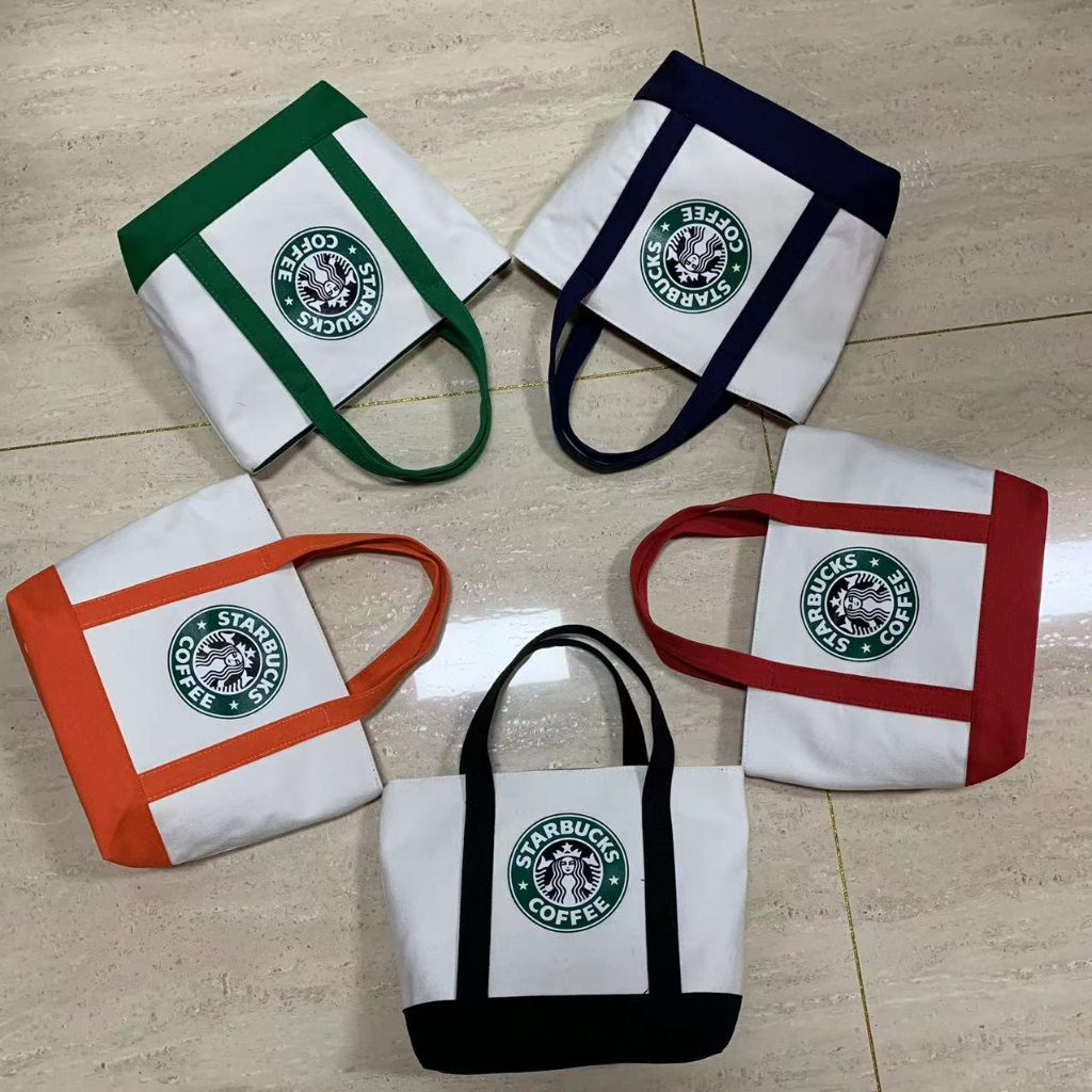 กระเป๋าถือ กระเป๋าช้อปปิ้ง ผ้าแคนวาส ลายนางเงือก Starbucks เหมาะกับใส่กล่องอาหารกลางวัน สําหรับเด็กนักเรียนผู้ชาย และผู้