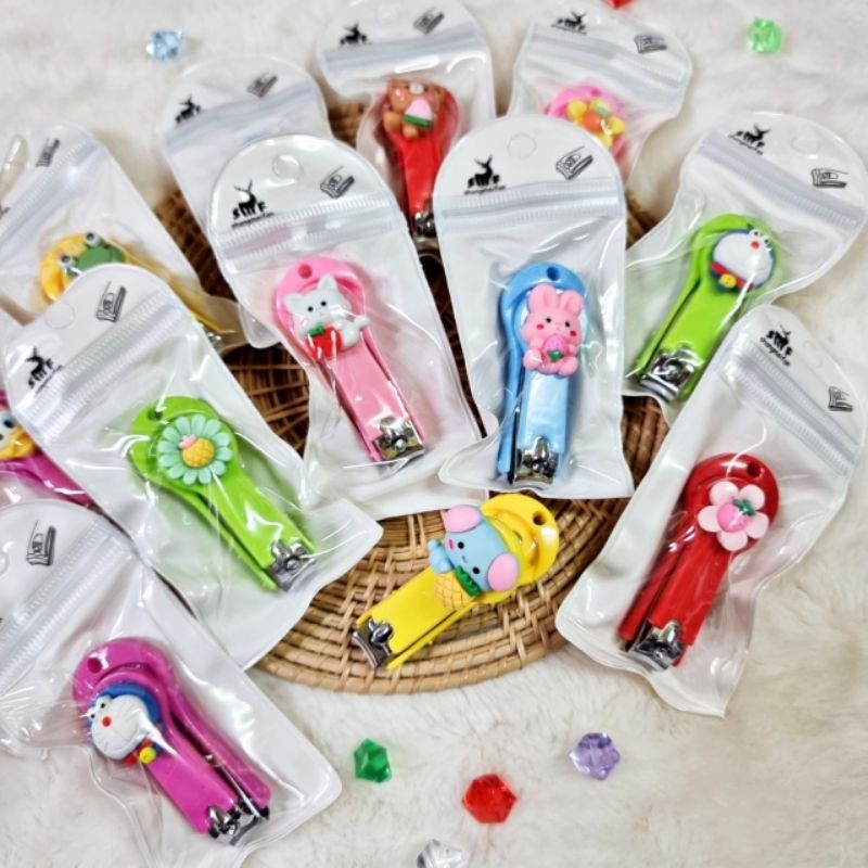 V...กรรไกรตัดเล็บซองขาว 12 ชิ้น (ราคาส่ง)