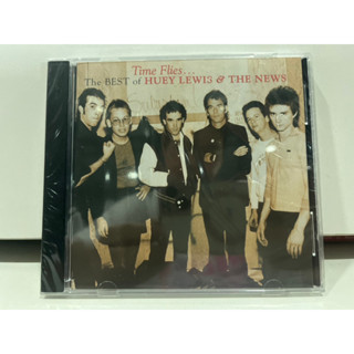 1   CD  MUSIC  ซีดีเพลง    Time Flu The Best Huey Lewis &amp; the News    (N1K32)