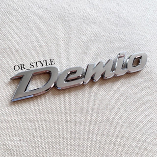 โลโก้ Demio ขนาด 15.5x2.8cm