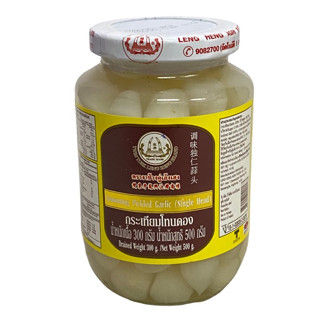 กระเทียมโทนดอง ตรา งาช้างคู่เล้งเฮง Seasoning Picked Garlic ( Single Head ) น้ำหนักสุทธิ 500g. 1ขวด/บรรจุปริมาณ 500g